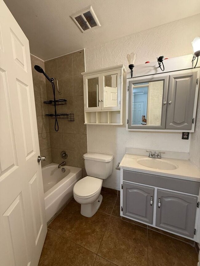 Building Photo - 2-Bedroom Townhouse Near Shopping, Dining & Freeway Access