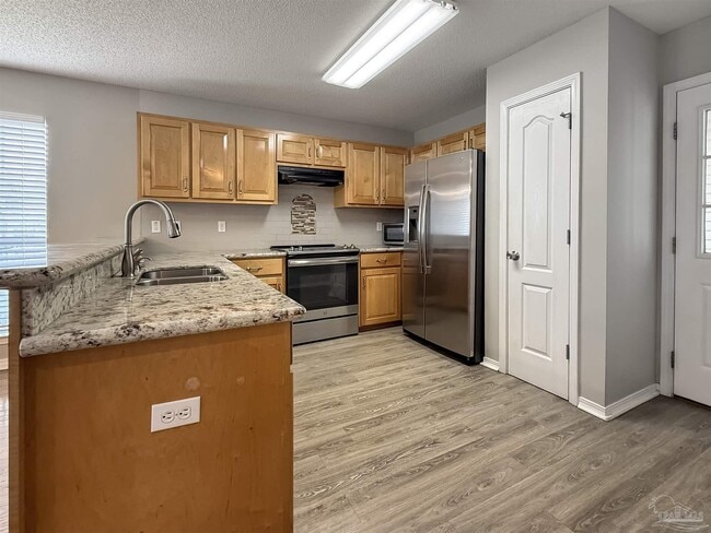 Building Photo - 2121 Pin High Dr