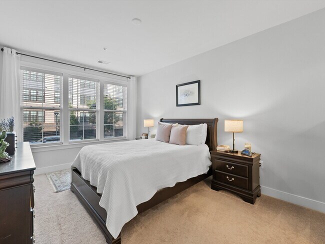 Building Photo - Discover Modern Comfort at Wind Charm Street