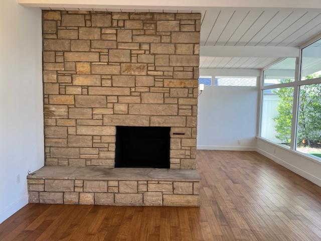 Wood burning, gas-assisted fireplace between living and dining rooms - 2812 Anchor Ave