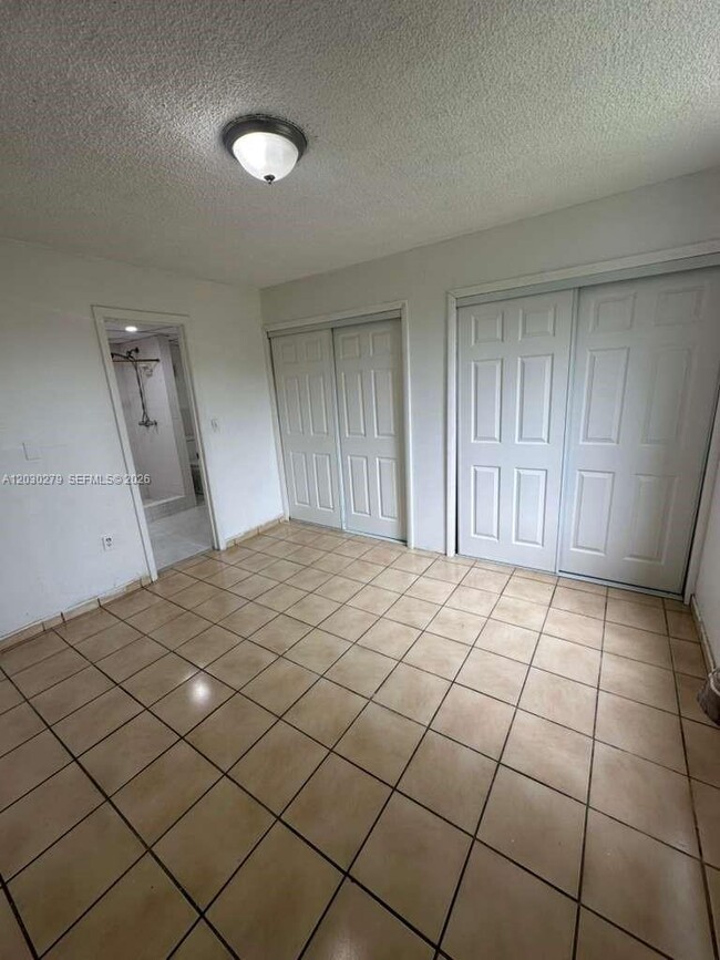 Building Photo - 10000 NW 80th Ct