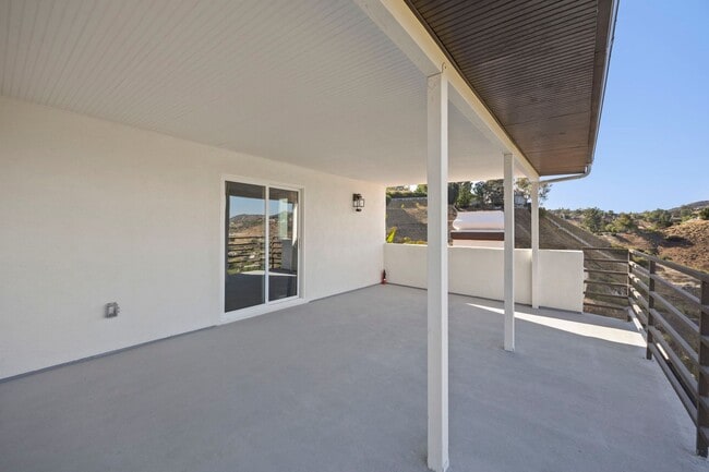 Building Photo - Modern Elegance Meets Scenic Privacy in Be...