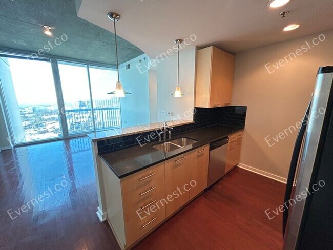 Building Photo - Experience Luxury Living with Stunning 1BR...