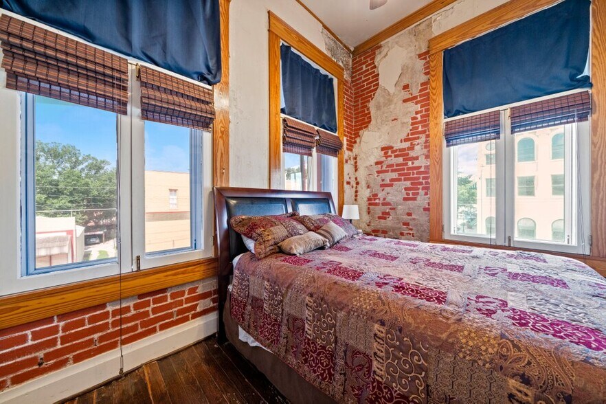 Bedrooms are large enough for king beds, but most have queens. - 202 E San Antonio St