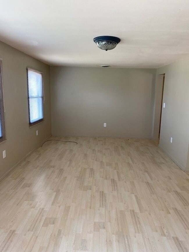 Building Photo - Introducing a charming 3-bedroom, 2-bathroom house located in the desirable Carolina Beach, NC.