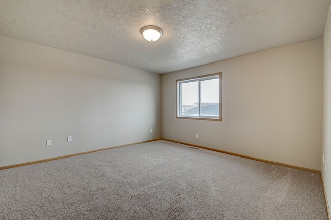 Building Photo - The Heights Condos in NW Minot