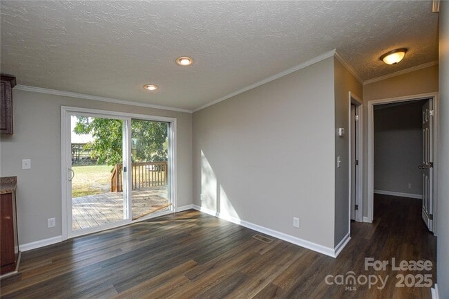 Building Photo - 711 W C J Thomas Rd