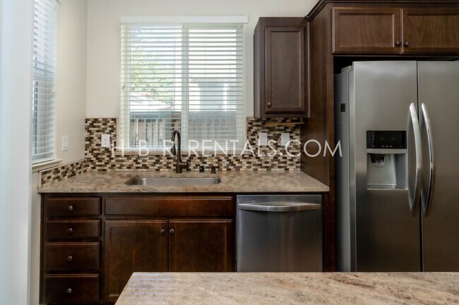 Building Photo - Spacious 4-Bedroom with Granite Finishes in Tracy – Your Dream Home Awaits!