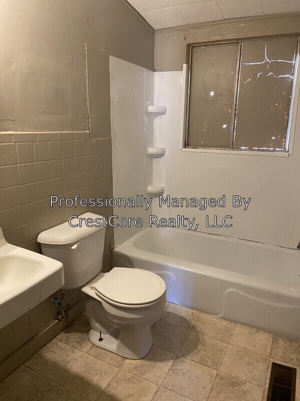 Building Photo - 105 W College St