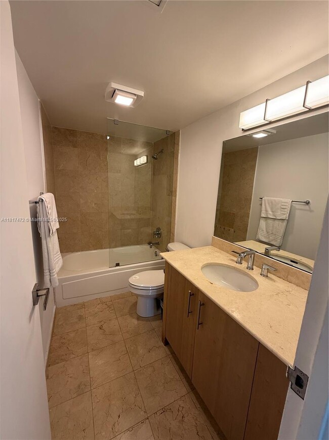 Building Photo - 10275 Collins Ave