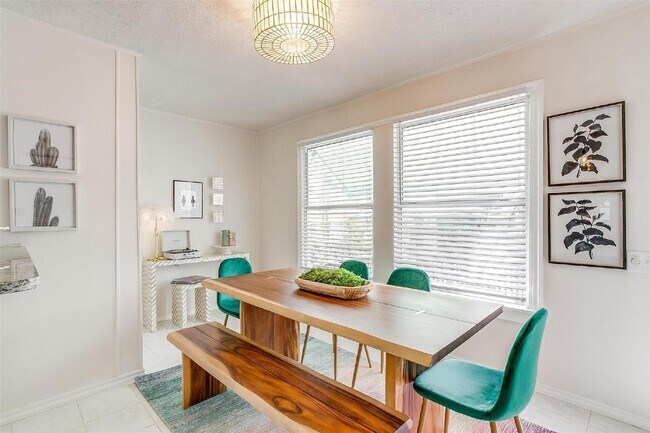 Building Photo - Charming 2-Bed, 2-Bath Gem with Granite Co...