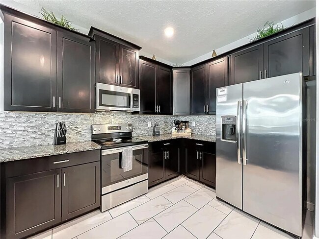 Building Photo - 9048 Sand Trap Dr