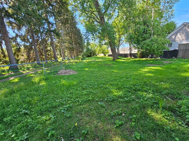 Building Photo - Duplex - 2 Bedroom, 2 Full Bathrooms and a 2 Car Garage. Updated Living Space with Hardwood Floor...