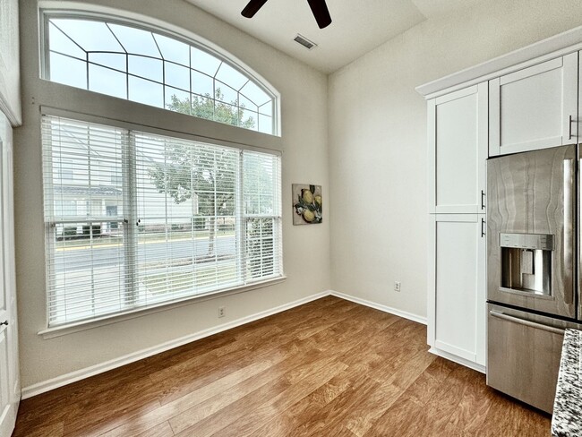 Building Photo - READY NOW!! End-Unit Loft-Style Condo w/1s...