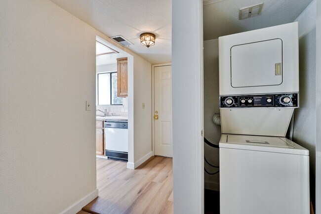 Building Photo - New Vinyl Plank Flooring, Fresh Interior Paint, 1 Car Garage + 1 Assigned Outdoor Parking Space -...