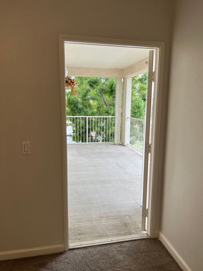 Second Bedroom Door to Balcony - 31230 Taylor Ln