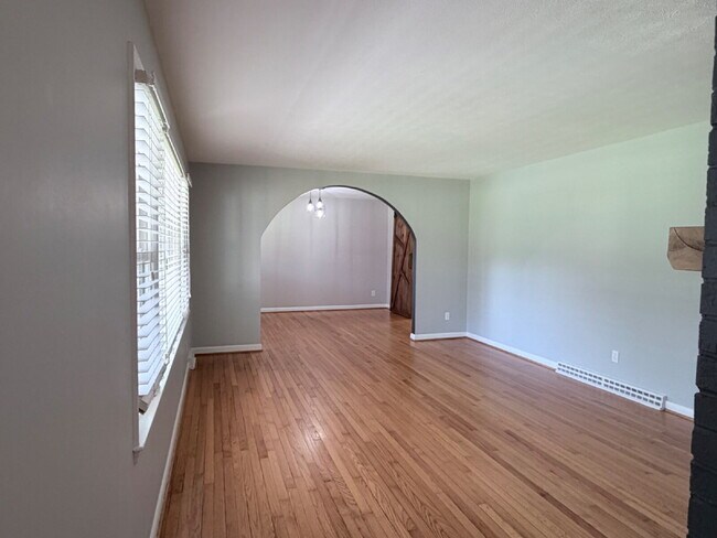 Building Photo - Updated 3BR Home in Beaver Lake | Fenced Yard, Garage, Covered Porch & Outdoor Fireplace | Pet Fr...