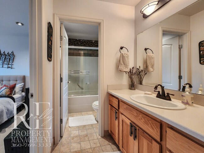 Building Photo - Light-Filled View Home with Vaulted Ceilings & Warm Wood Finishes