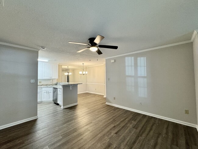 Building Photo - Updated 1st Floor/1-Level Condo Available NOW & Rent Includes Water, Sewer, Trash, Landscaping, F...