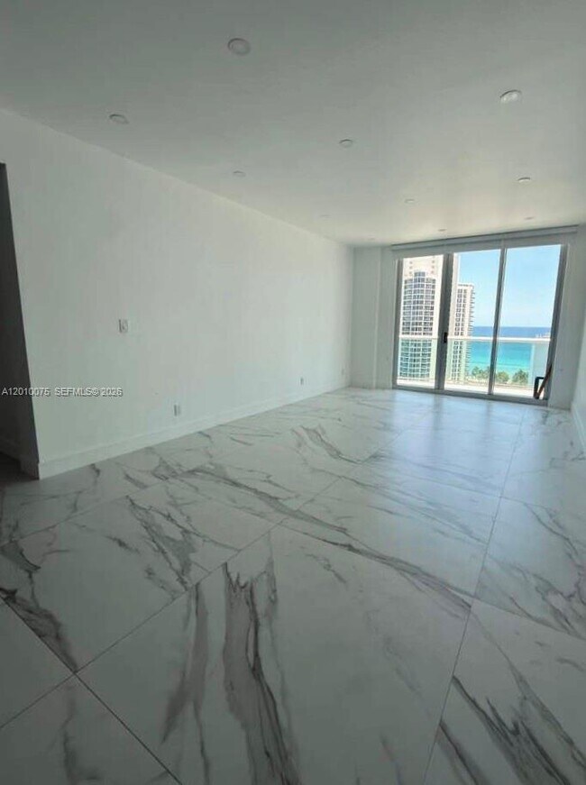 Building Photo - 19370 Collins Ave