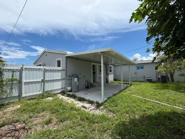Building Photo - 9016 NW 35th Ct