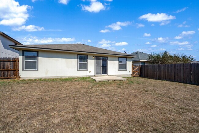 Building Photo - 4935 Dahlia Terrace