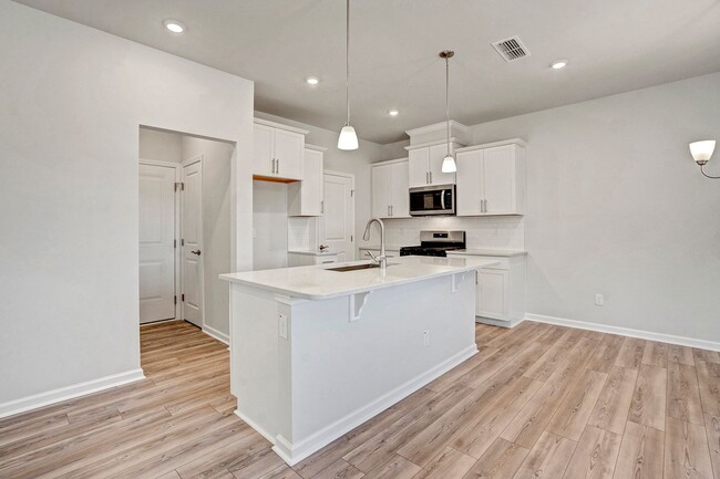 Building Photo - Welcome to this BRAND NEW TOWNHOME- Close ...