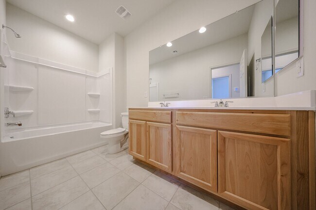 Building Photo - New 4 Bedroom + Den Home in Asante Community