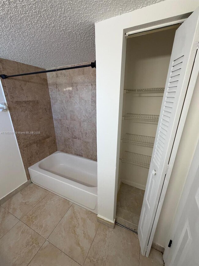 Building Photo - 10701 Royal Palm Blvd