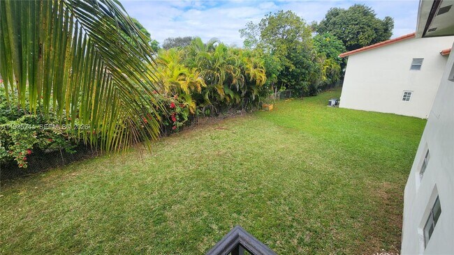 Building Photo - 3090 Coral Springs Dr