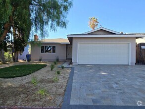 Building Photo - Renovated and Remodeled, New Driveway, New...