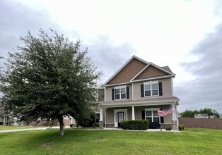 Building Photo - Welcome to The Bluffs on New River!