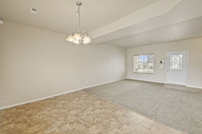 Building Photo - Spacious 4-Bedroom Home with Loft, Solar & Fenced Backyard