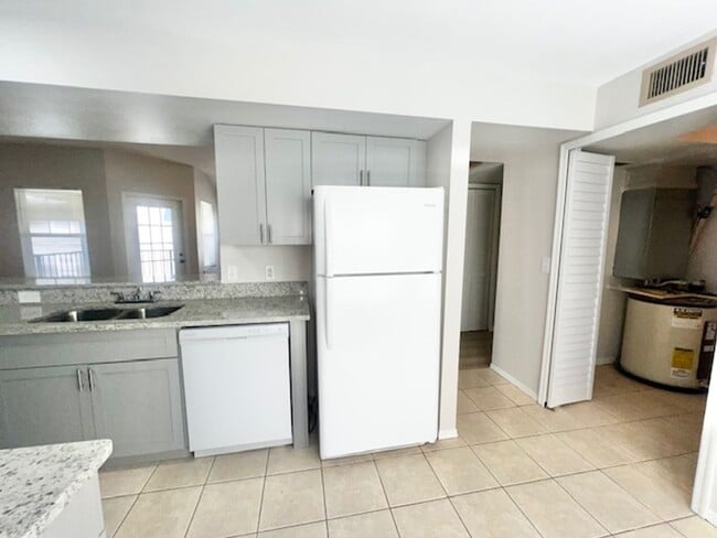 Building Photo - MOVE NOW-Remodeled bathroom & kitchen! NEW VINYL PLANK flooring & fresh paint! 2 bedroom 1 bath c...