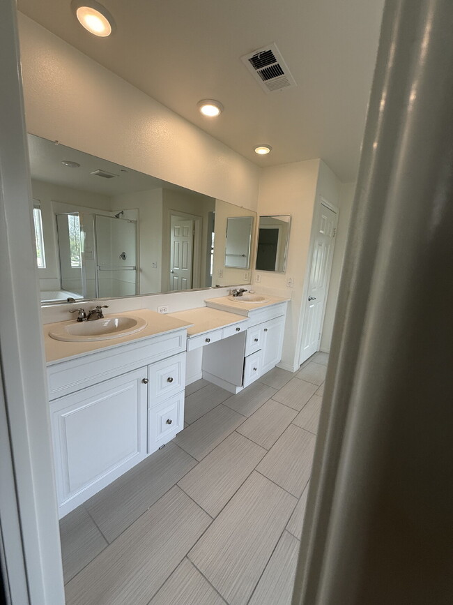 Building Photo - New flooring & paint!  Large backyard - landscaped and ready for garden!   Community pool, fitnes...