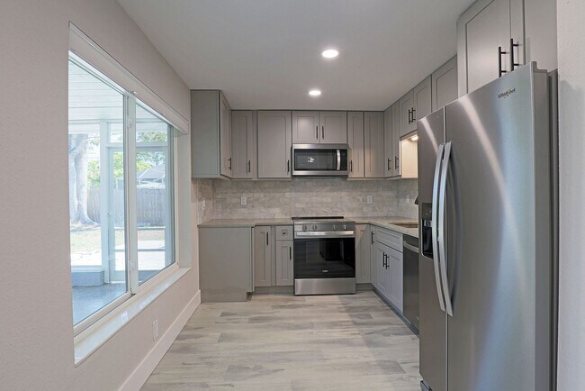 Building Photo - AVAILABLE NOW