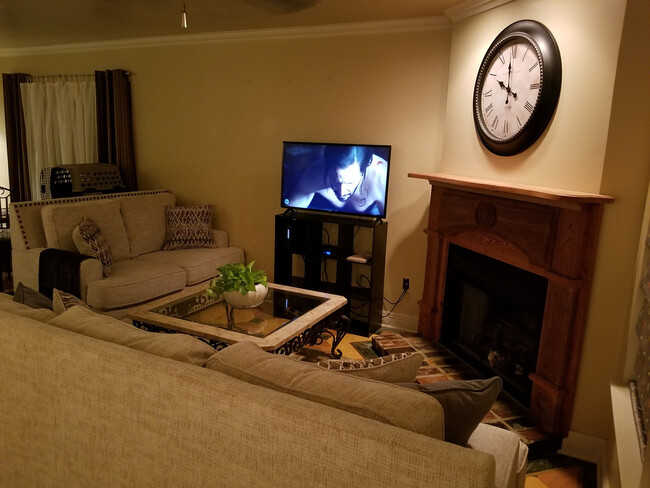 Wood-Burning Fireplace in an Open, yet serene, Living Area - 416 Doucet Rd