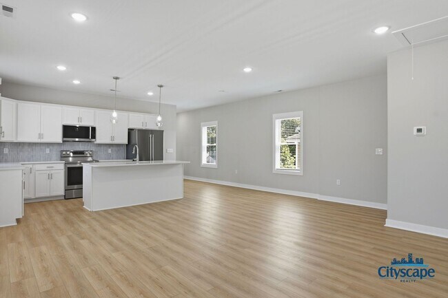 Building Photo - CHIC NEW 2 BEDROOM APARTMENT IN THE CHURCH HILL NORTH NEIGHBORHOOD