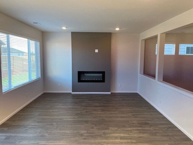 Building Photo - New Construction! Four Bedroom Home in Woo...