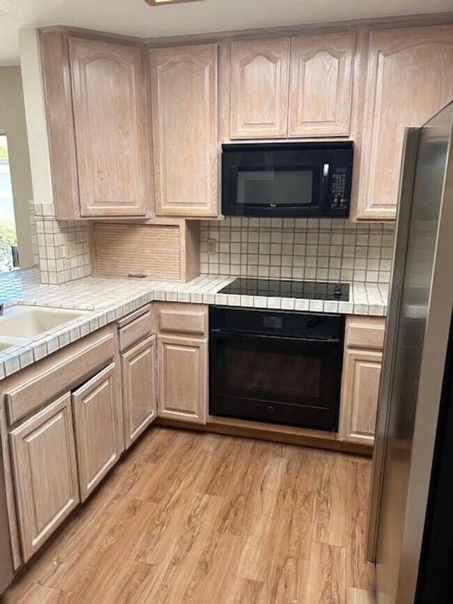 Building Photo - Single level 2-bedroom 2-bath home in private community of Ocean Hills