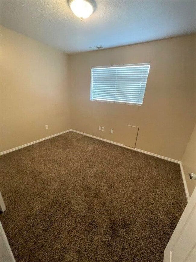 Building Photo - Move-In Ready 5-Bed with Garage, Yard & Up...