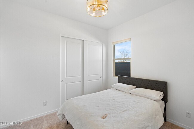 Building Photo - 10812 E Tesla Ave