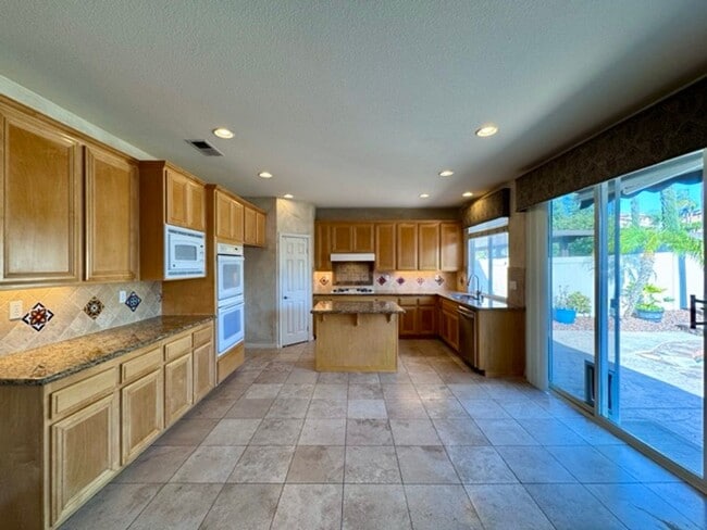 Building Photo - Stunning expansive 3 Bedroom Redhawk Home with Office, Loft & Pool/Spa!