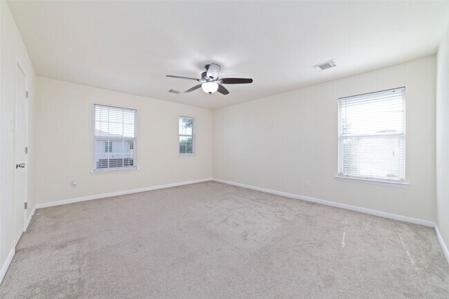 Building Photo - 8418 Village Rose Ln