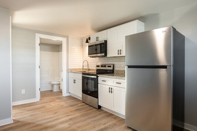 Primary Photo - Discover Modern Living at Genesis Apartmen...
