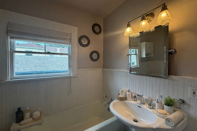 Building Photo - Lakeshore Craftsman with Detached Cottage and Versatile Bonus Rooms