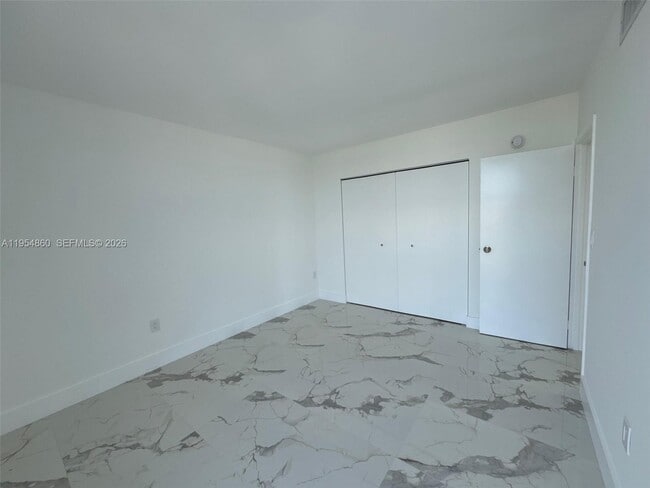 Building Photo - 3675 N Country Club Dr