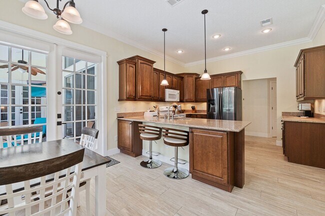 Building Photo - Beautiful 3/3 Pool Home in Gated Community W/ Lake Access