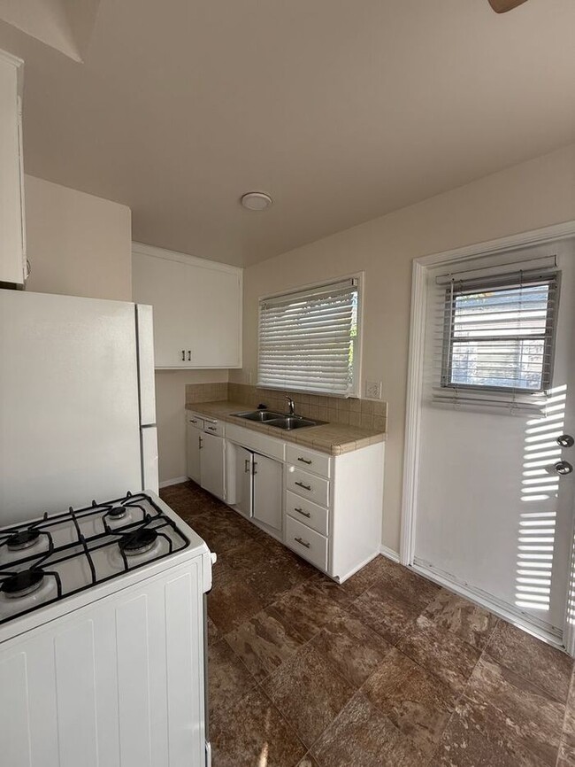 Building Photo - Renovated 1BR/1BA Cottage with Classic Character and Inviting Charm