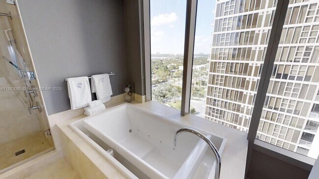 Building Photo - 9701 Collins Ave